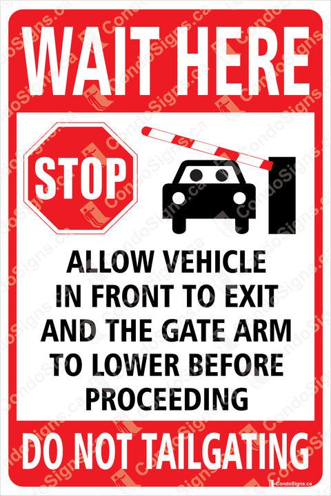 WAIT HERE-ALLOW VEHICLE IN FRONT TO EXIT AND THE GATE ARM TO LOWER BEFORE PROCEEDING
