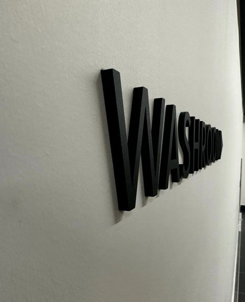 Washroom with Left-Facing Arrow (Raised Lettering with 3M Adhesive)